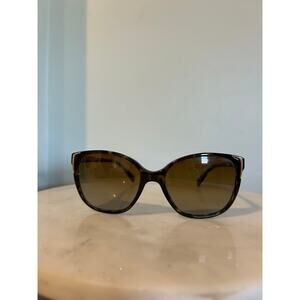 Prada Conceptual PR 01OS sunglasses in a Havana frame color